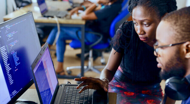 People infont of a computer