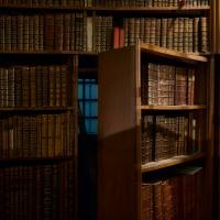 bookcase opening to another room